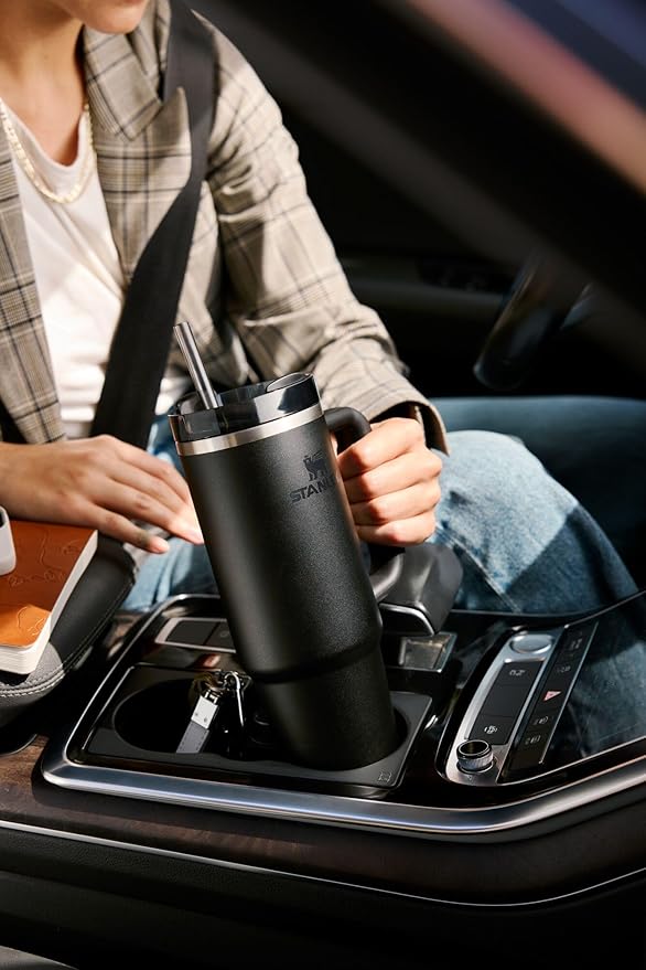 STANLEY Quencher H2.0 Tumbler with Handle and Straw 20 oz | Flowstate 3-Position Lid | Cup Holder Compatible for Travel | Insulated Stainless Steel Cup | BPA-Free | Spring Green